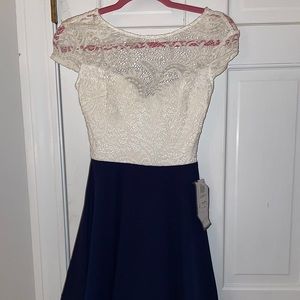Macy’s Navy/Offwhite dress.